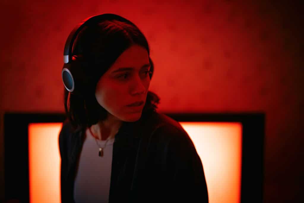 Nina Kiri's Evy hears something suspicious in UNDERTONE (Credit: A24)