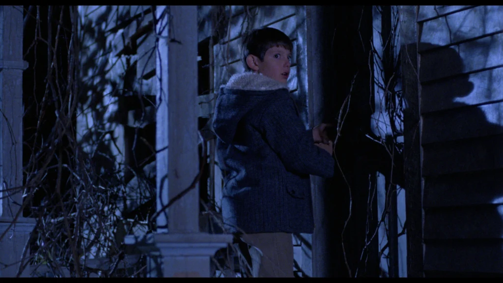 Lukas Haas in LADY IN WHITE. (Credit: New Century Vista Film Company)