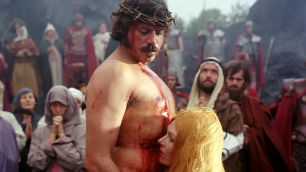 Oliver Reed and Vanessa Redgrave in THE DEVILS. (Credit: Warner Brothers)