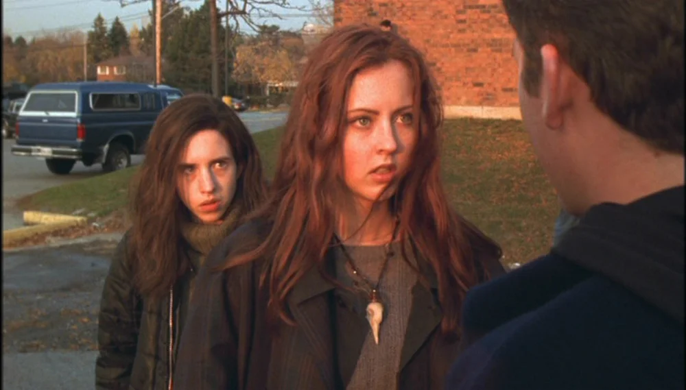 Emily Perkins and Katharine Isabelle in John Fawcett's GINGER SNAPS. (Credit: Lionsgate)