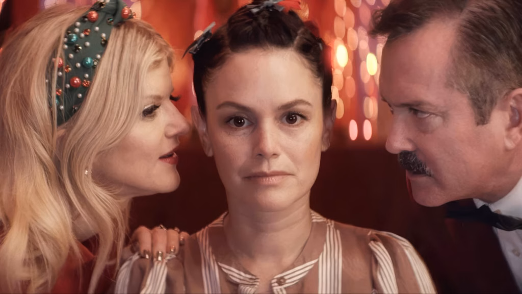 Arden Myrin, Rachel Bilson, and Thomas Lennon in CHRISTMAS AT THE KRINGLES. (Credit: Briarcliff Entertainment)