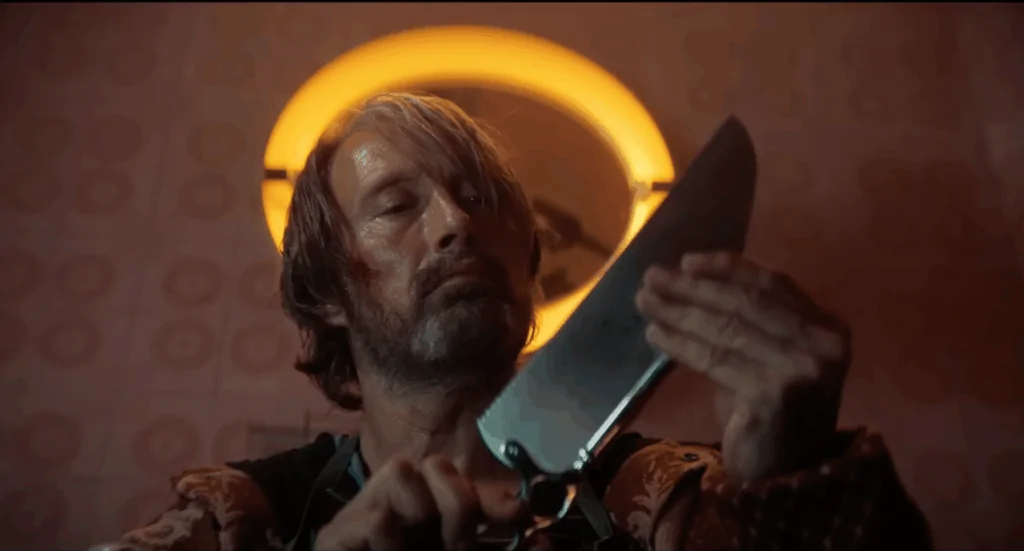Mads Mikkelsen in DUST BUNNY/screenshot courtesy of Roadside Flix