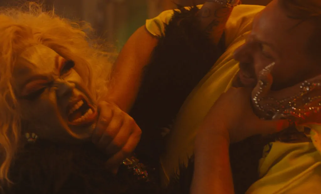 QUEENS OF THE DEAD - A BLONDE DRAG QUEEN ZOMBIE BATTLES A MALE CHARACTER