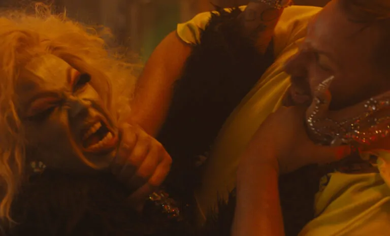 QUEENS OF THE DEAD - A BLONDE DRAG QUEEN ZOMBIE BATTLES A MALE CHARACTER