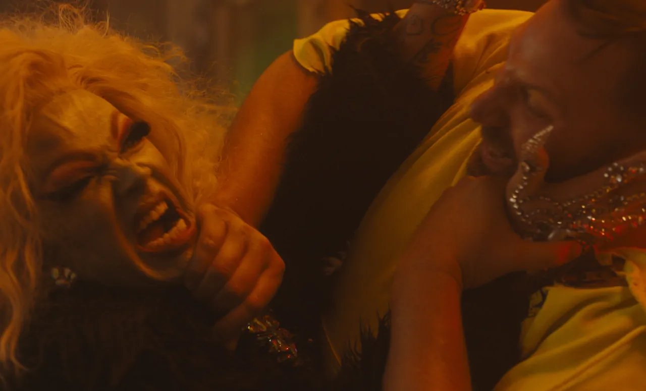 QUEENS OF THE DEAD - A BLONDE DRAG QUEEN ZOMBIE BATTLES A MALE CHARACTER