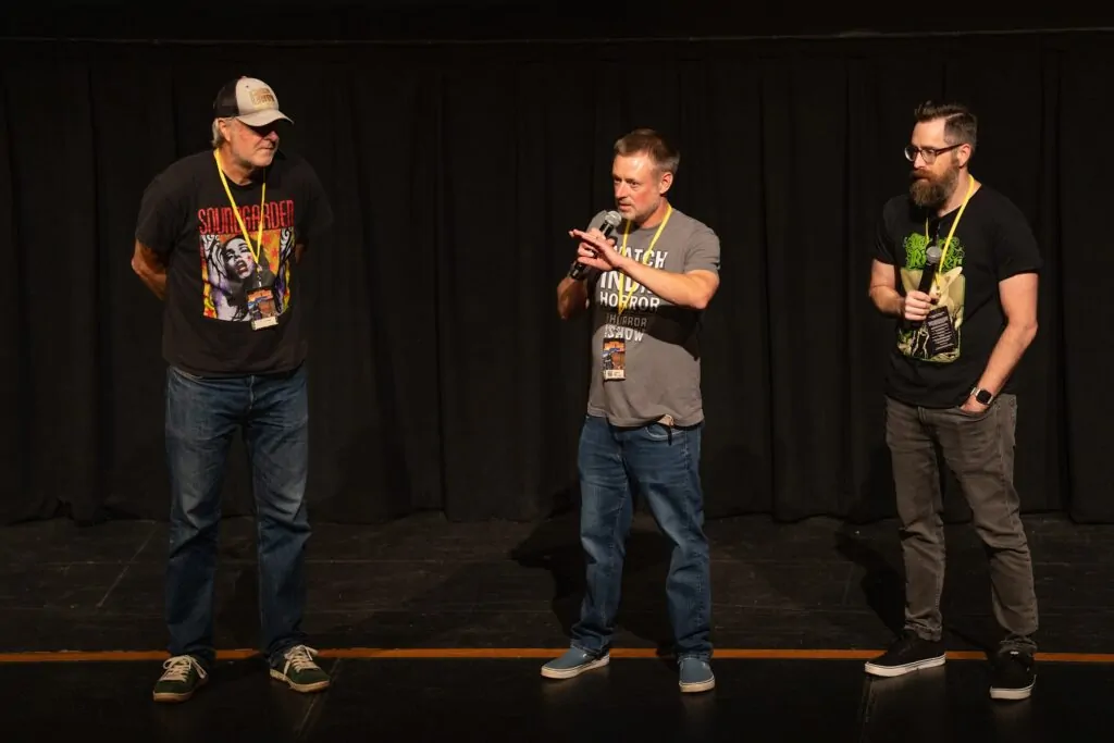 Erik Cooper, Ted Wilson and Brad McHargue onstage at Telluride Horror Show