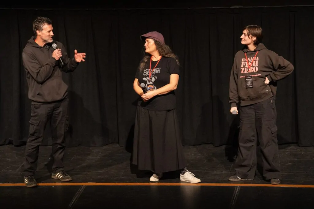 John Adams, Toby Poser and Zelda Adams on stage at Telluride Horror Show