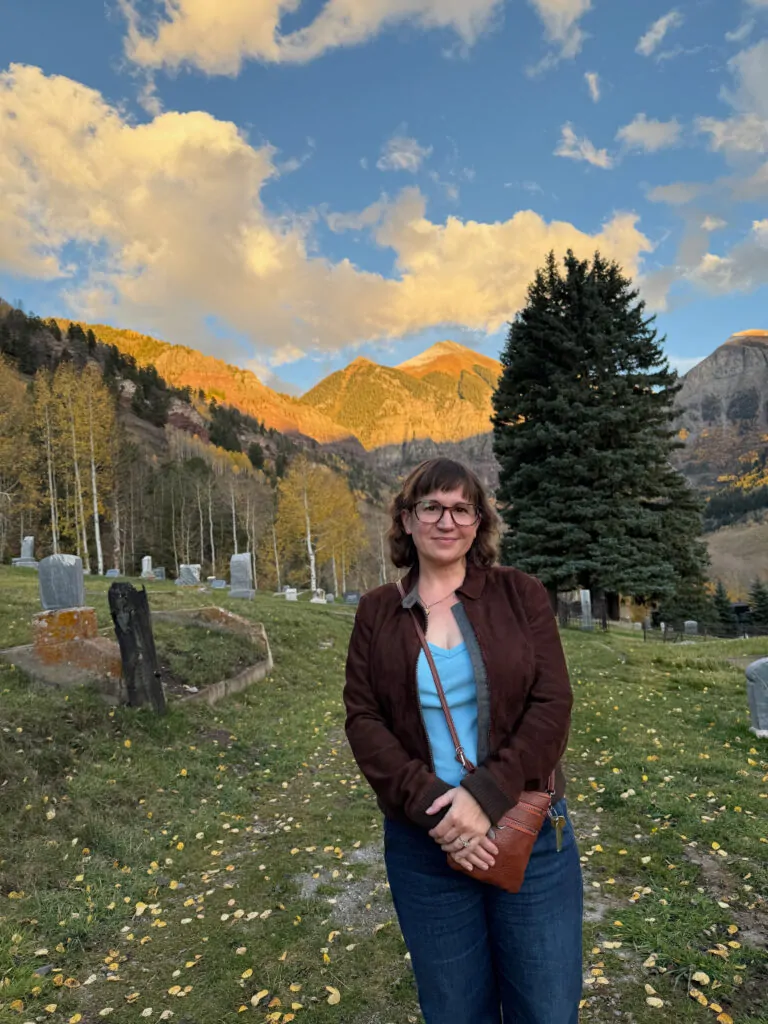 Meredith Borders standing in the Telluride Cemetery