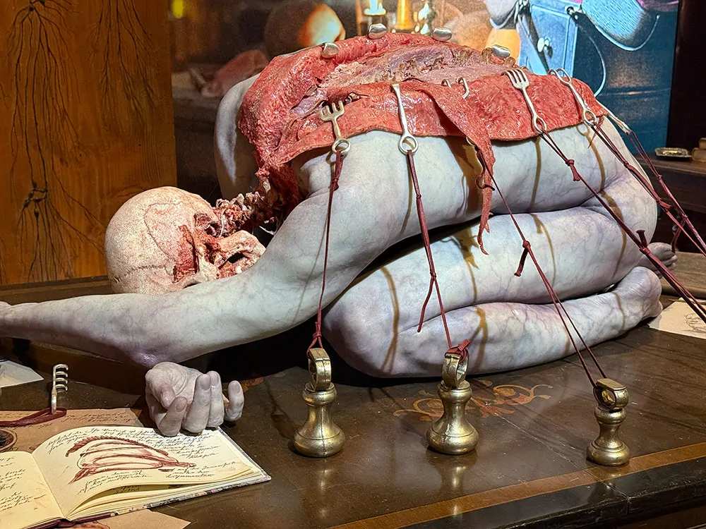 FRANKENSTEIN bent over corpse by Mike Hill (Credit: Angel Melanson)