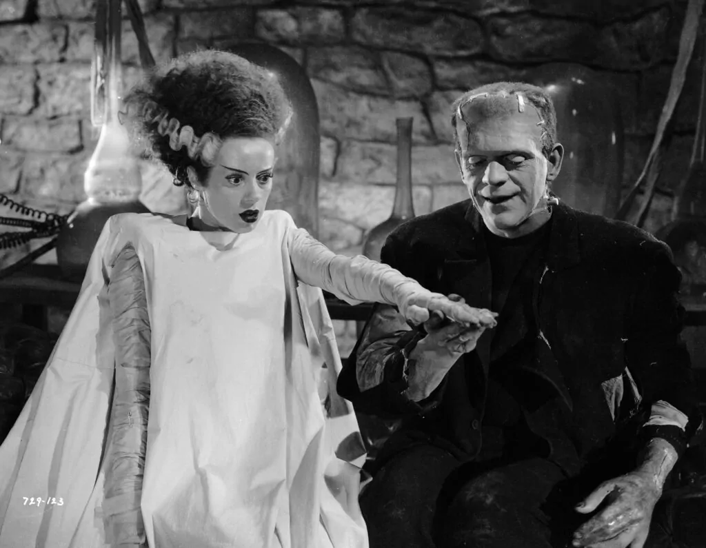 Elsa Lanchester as The Bride of Frankenstein and Boris Karloff as The Creature in James Whale's BRIDE OF FRANKENSTEIN (Photo via John Kobal Foundation/Getty Images)