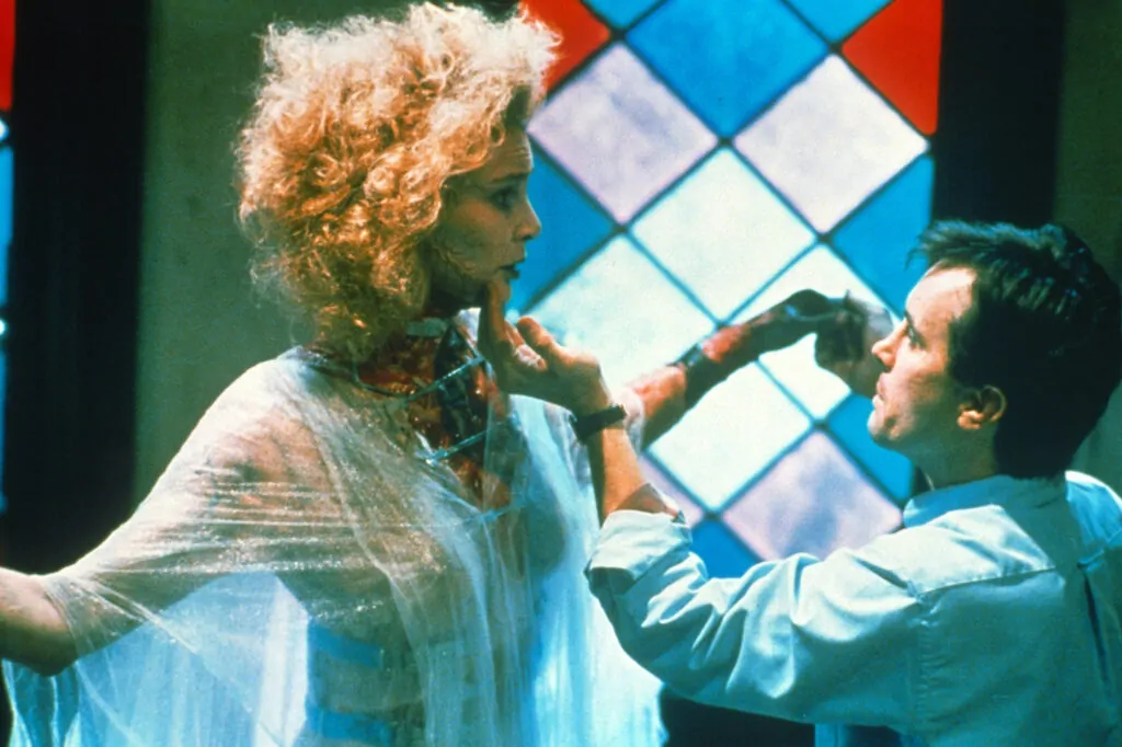 Kathleen Kinmont and Jeffrey Combs in Brian Yuzna's BRIDE OF RE-ANIMATOR (Credit: IMDb)