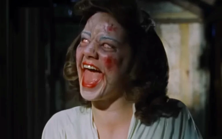 Linda won't stop laughing in Sam Raimi's 1981 horror classic EVIL DEAD (Credit: Ghosthouse Pictures)