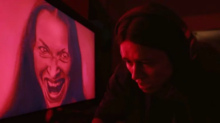 A creepy woman on the screen in Undertone