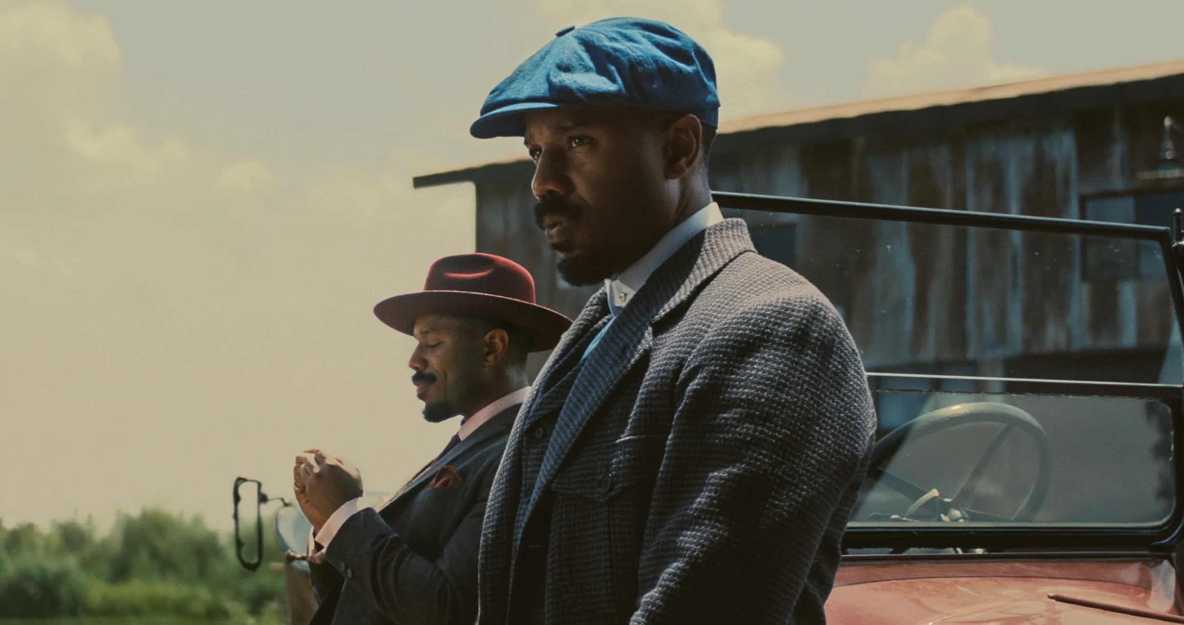 Michael B. Jordan as Smoke & Stack in SINNERS (Credit: Warner Bros.)