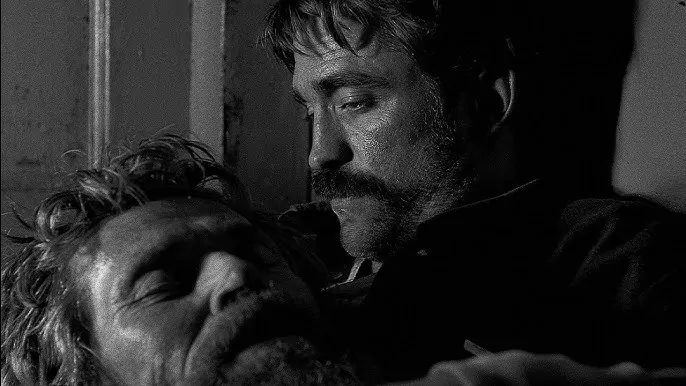 Willem Dafoe and Robert Pattinson in Robert Eggers' THE LIGHTHOUSE (Credit: A24)