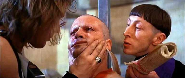 Michael Gothard, Oliver Reed, and Murray Melvin in a pivotal scene of the 1971 controversial historical horror film THE DEVILS by Ken Russell.