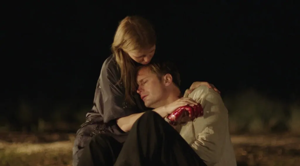 Mia Goth and Alexander Skarsgård in INFINITY POOL (Credit: NEON)