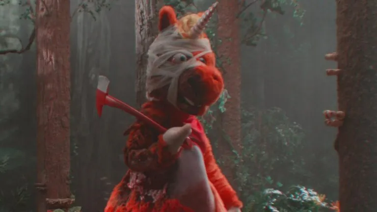 Buddy holding an ax in Buddy