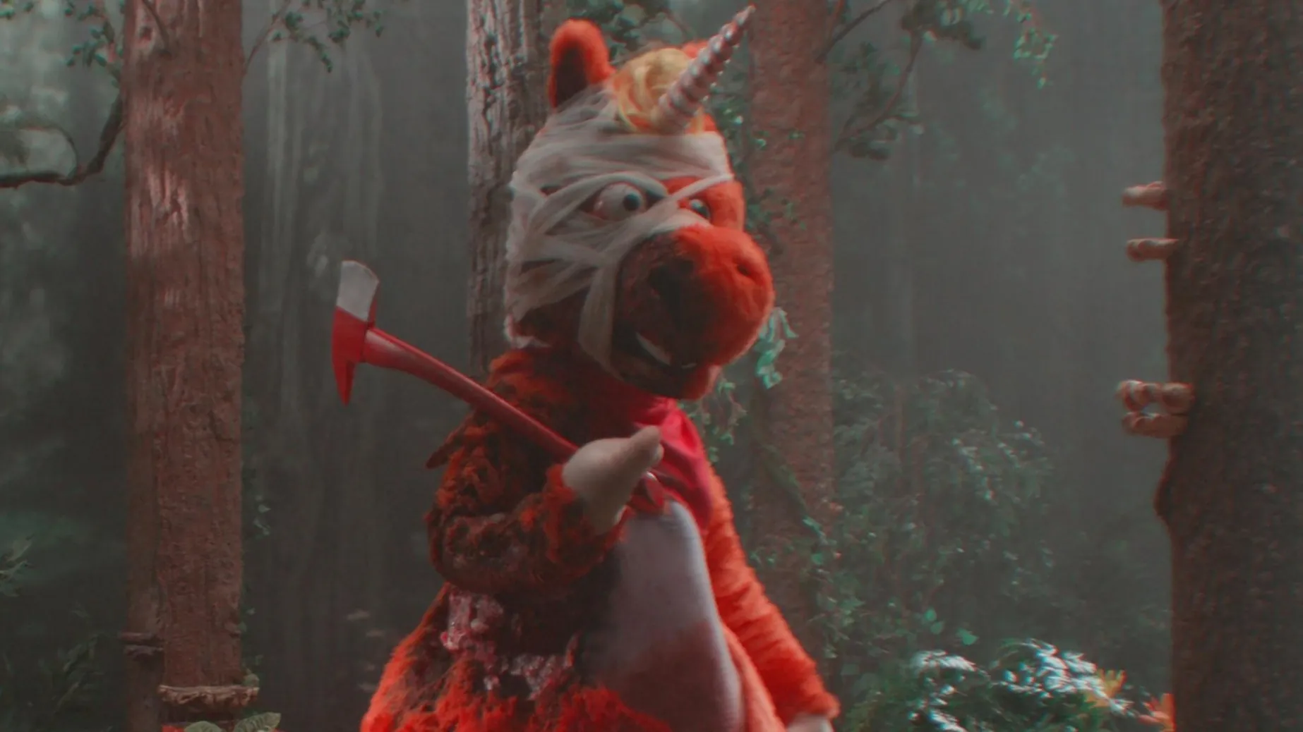 Buddy holding an ax in Buddy
