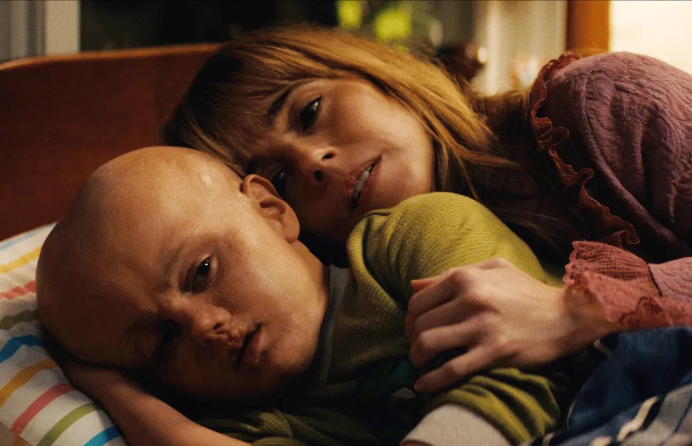 Callum Vinson and Linda Cardellini in CRYSTAL LAKE. (Credit: Peacock)