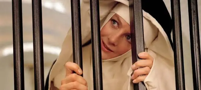 Vanessa Redgrave in THE DEVILS. (Credit: Warner Bros.)
