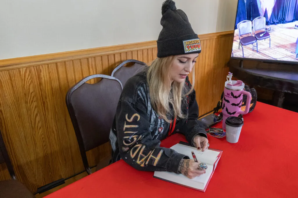CJ Leede at Telluride Horror's Show's book fair.